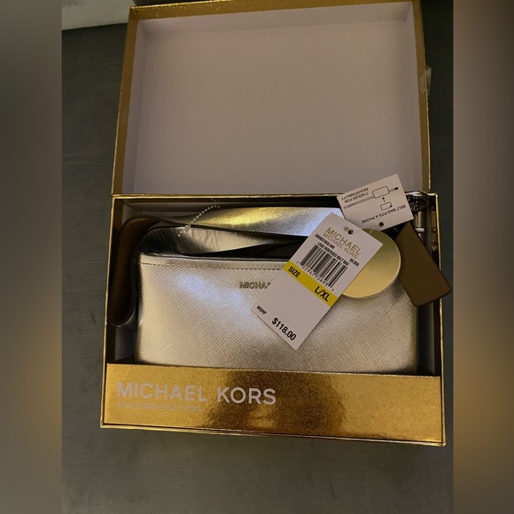 Michael Kors Handbags - NWT In box Michael Kors adjustable belt. Logan belt bag, silver L/XL $118msrp